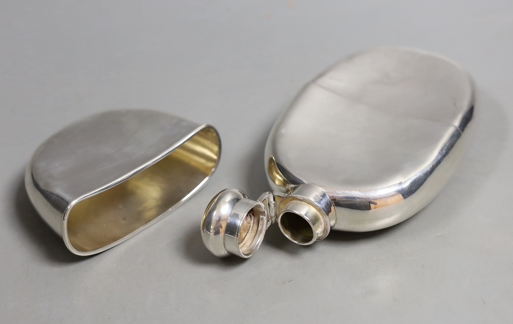 An Edwardian silver hip flask, Atkin Brothers, London, 1907, 15.1cm.